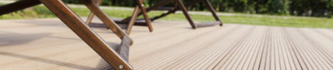 Close up of chair leg on decking